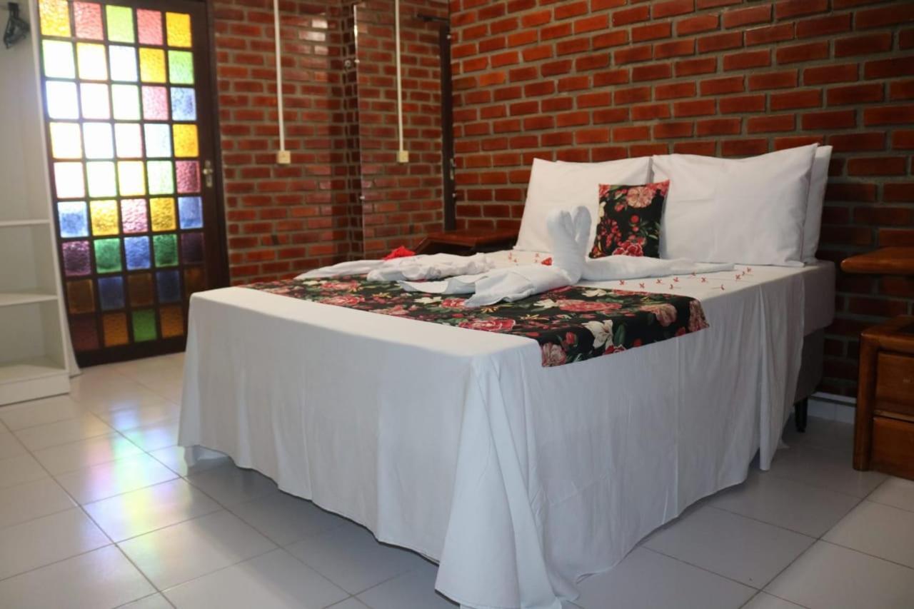 Suíte com Vista para a Piscina
